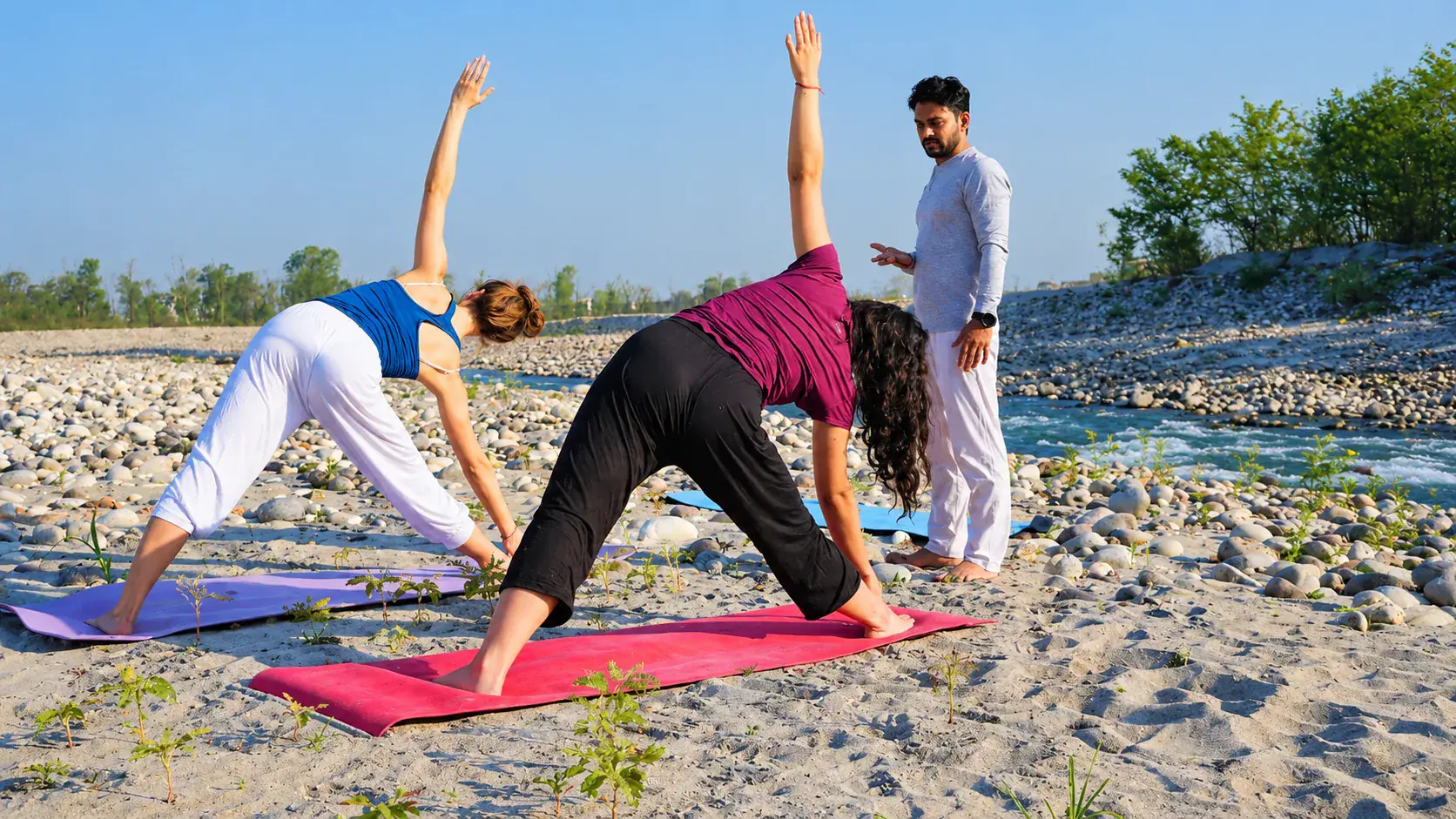 Morning asana and alignment practice on the banks of Ganga, Rishikesh
