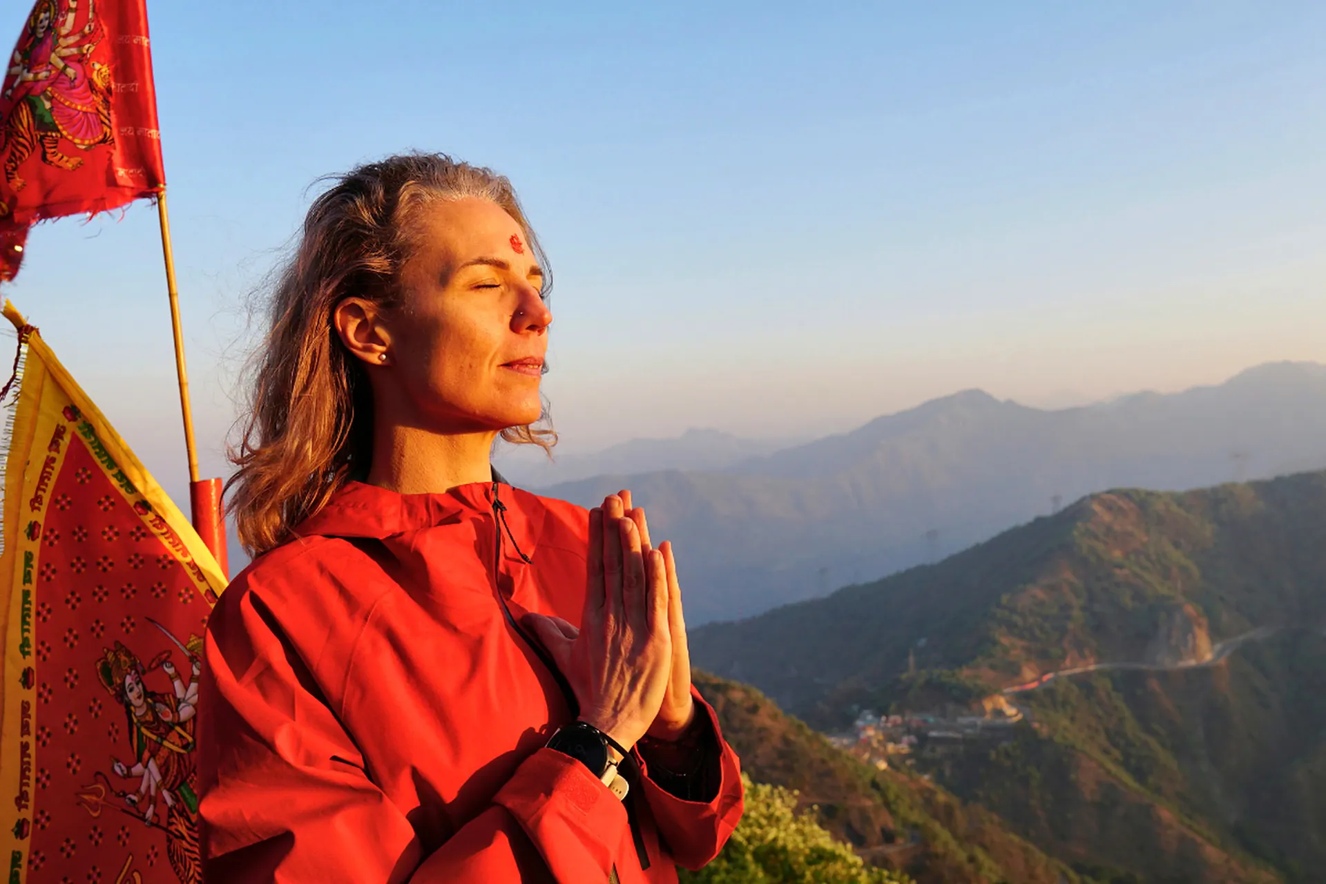 Sunrise prayer with Himalayan views during kundalini retreat