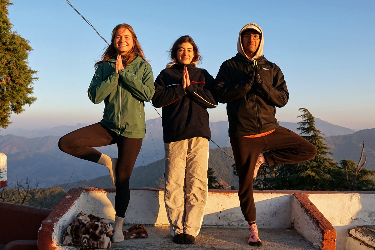 Tree pose on the rooftop during the morning Haṭha class