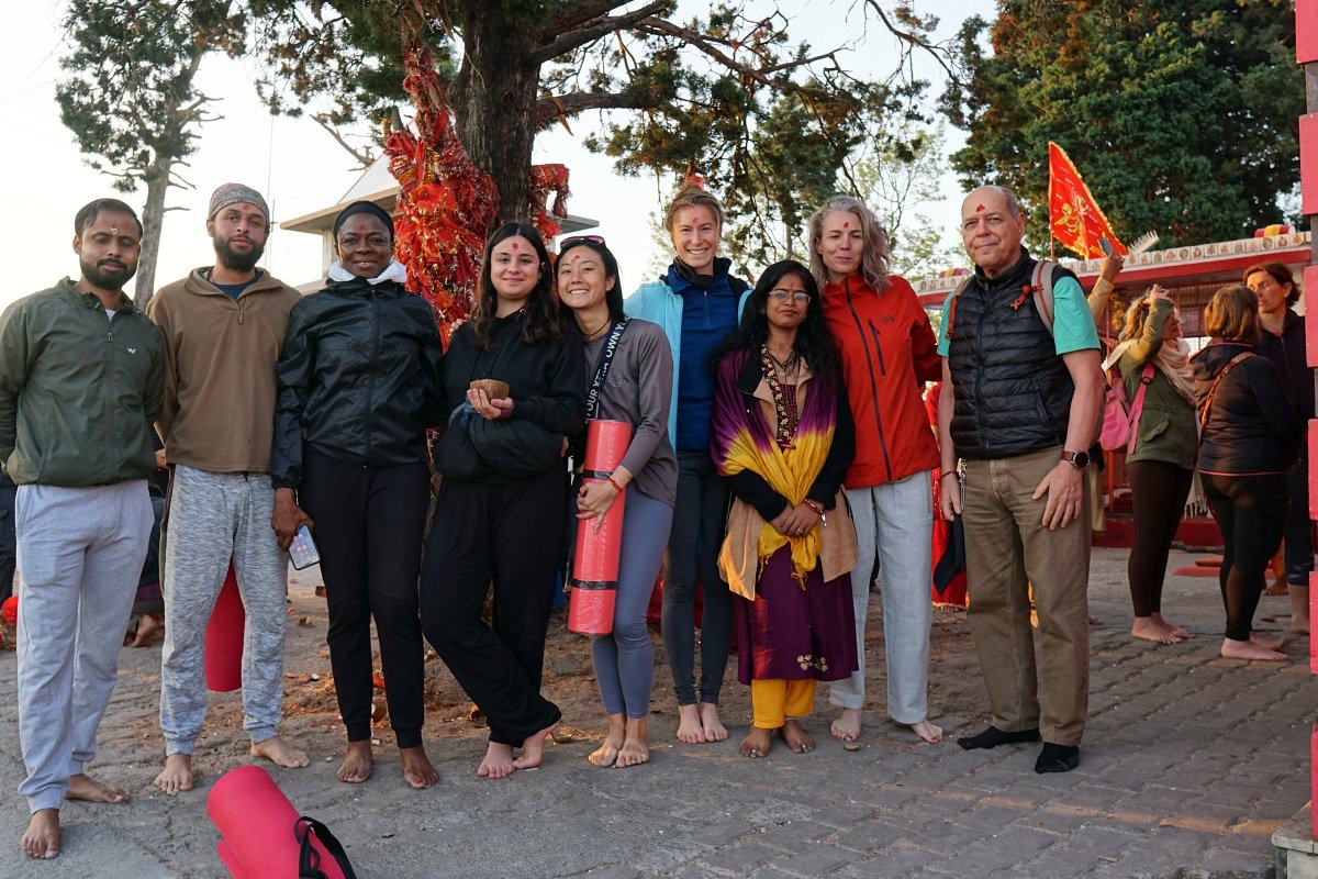 Yoga retreat group on a temple visit near Rishikesh