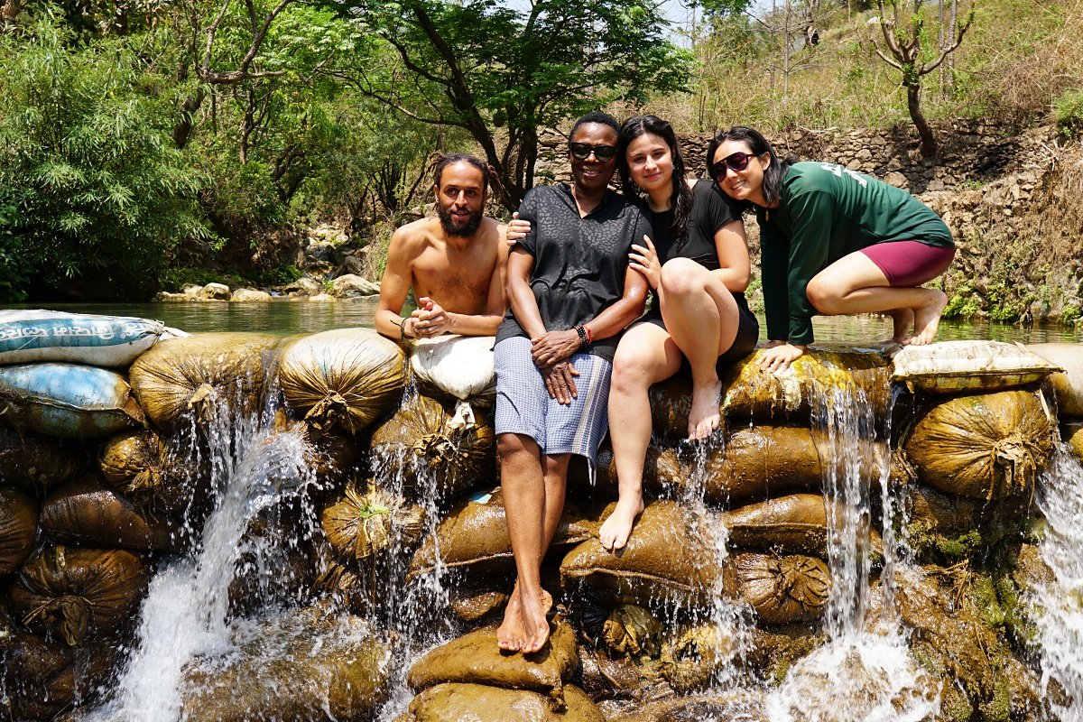 Students on a weekly day-off excursion to a waterfall near Rishikesh