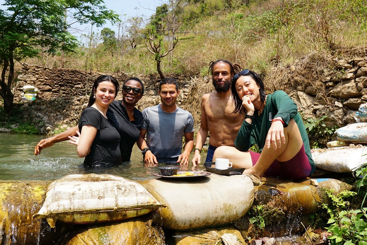 Retreat group at a waterfall pool excursion near Rishikesh