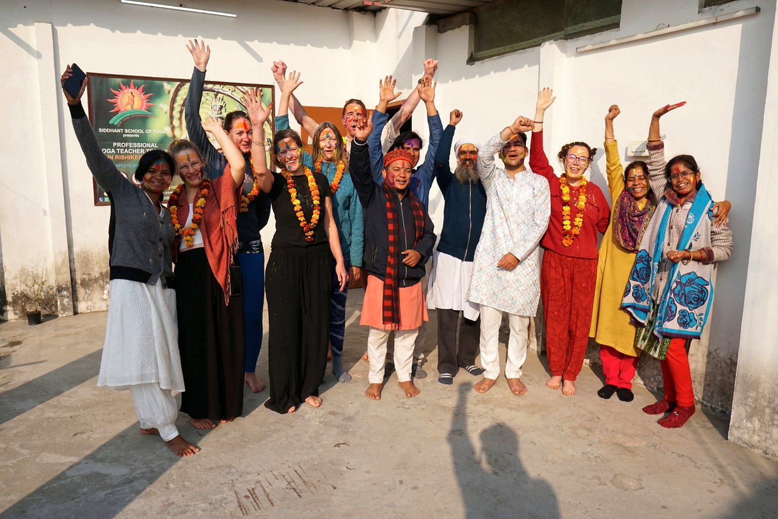 Yoga teacher training graduates celebrating at Siddhant School of Yoga