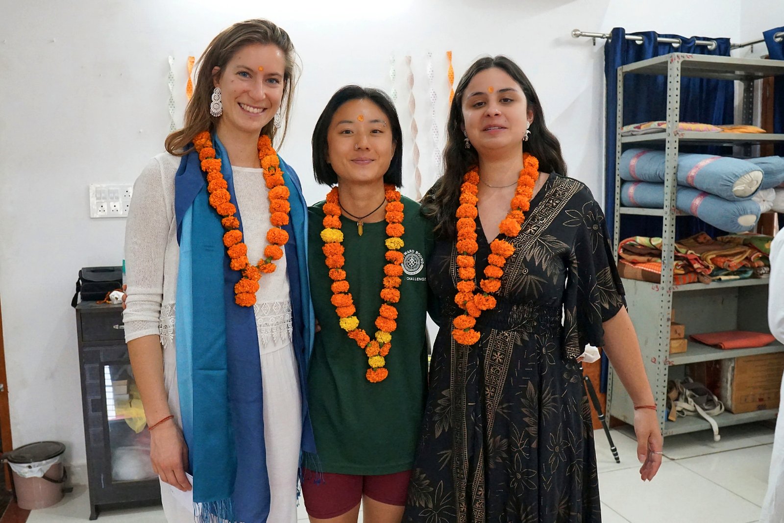 Yoga TTC graduates with marigold garlands at Siddhant School of Yoga