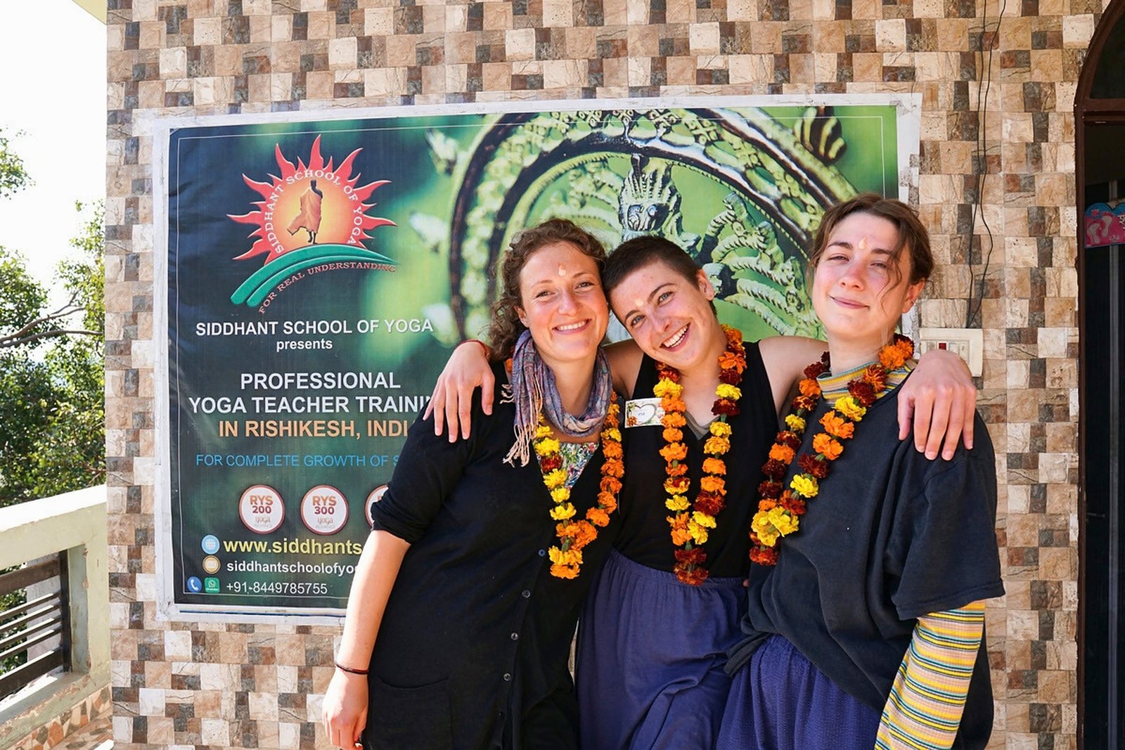 An international batch of yoga teacher training graduates at Siddhant School of Yoga